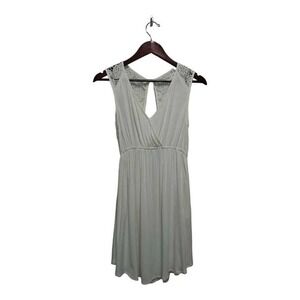Sleeveless cream dress by Mimi Chica.  Size small